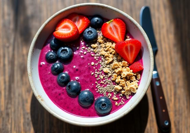 Healthy breakfast bowl with vibrant fruits and grains